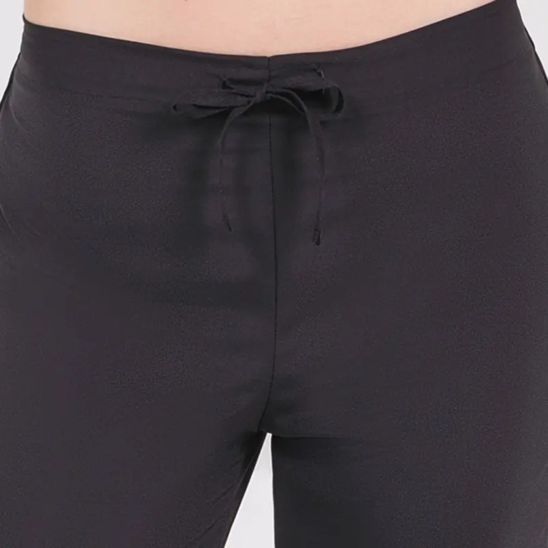 Pantalón de chica negro acampanado - Dyneke 8584786